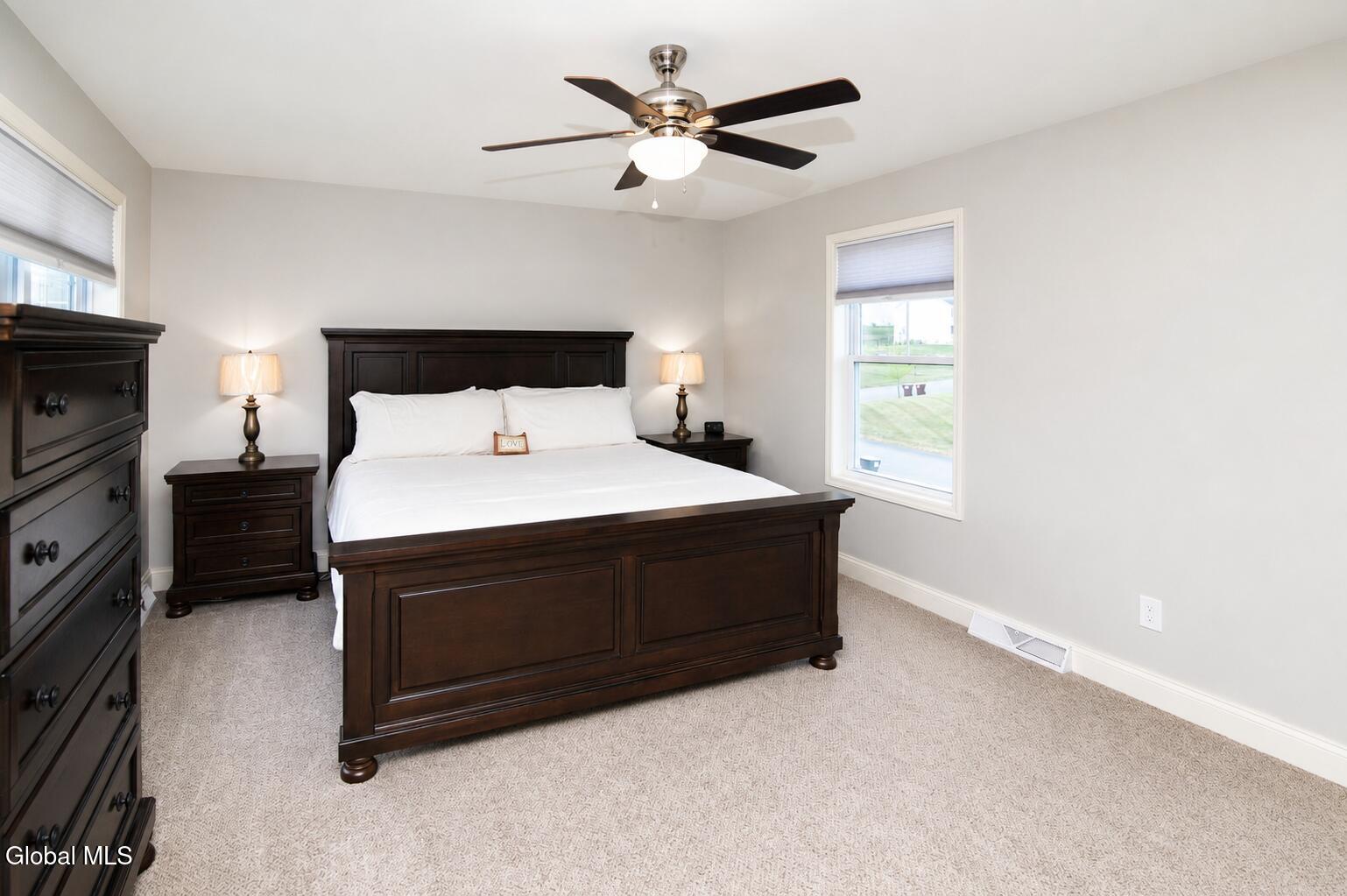 Primary bedroom photographed for a Clifton Park real estate listing