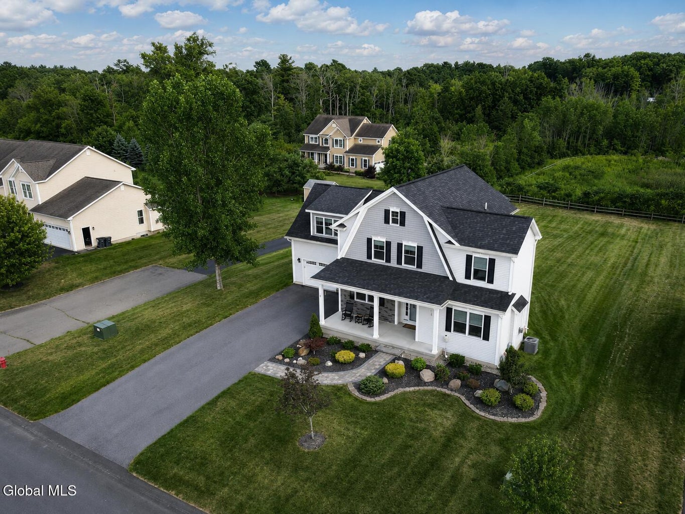 Exterior real estate photograph of 21 Tisdale Lane in Clifton Park